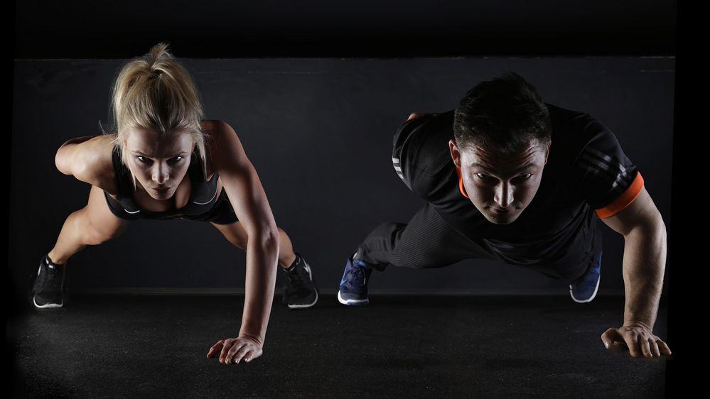 Man and woman working out